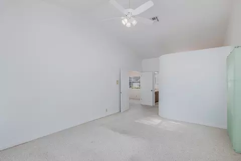Bedroom - 8912 Thoreau Pl, Hudson, FL 34667 photo 4 of 9