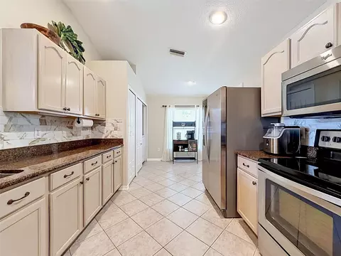Kitchen - 26714 Middleground Loop, Wesley Chapel, FL 33544 photo 3 of 6