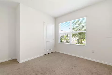 Bedroom - 9014 Forge Breeze Loop, Wesley Chapel, FL 33545 photo 2 of 13