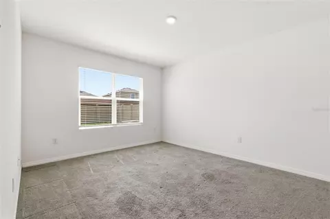 Bedroom - 9014 Forge Breeze Loop, Wesley Chapel, FL 33545 photo 10 of 13