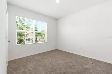 Bedroom - 9014 Forge Breeze Loop, Wesley Chapel, FL 33545 photo 1 of 13