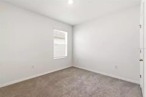 Bedroom - 9014 Forge Breeze Loop, Wesley Chapel, FL 33545 photo 4 of 13