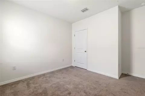 Bedroom - 9014 Forge Breeze Loop, Wesley Chapel, FL 33545 photo 5 of 13