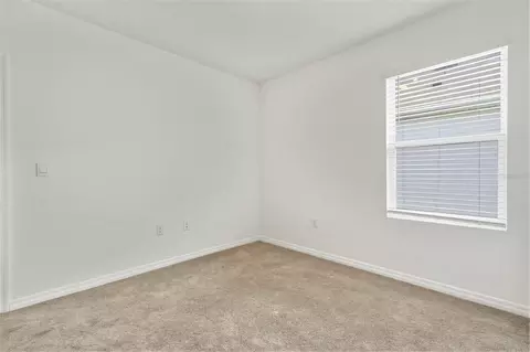 Bedroom - 9014 Forge Breeze Loop, Wesley Chapel, FL 33545 photo 6 of 13