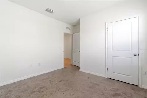 Bedroom - 9014 Forge Breeze Loop, Wesley Chapel, FL 33545 photo 3 of 13