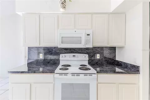 Kitchen - 11261 Mcracken Dr, Spring Hill, FL 34609 photo 5 of 6