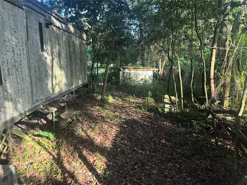 Exterior - 1128 N Jackson Ave S, Spring Hill, FL 34604 photo 6 of 9