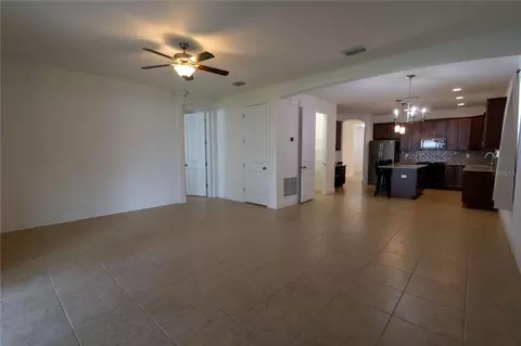 Living - 1214 Florablu Dr, Seffner, FL 33584 photo 9 of 12