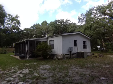 Exterior - 12199 SW 44th Dr, Webster, FL 33597 photo 3 of 16