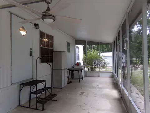 Exterior - 12199 SW 44th Dr, Webster, FL 33597 photo 7 of 16