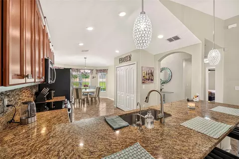 Kitchen - 10114 Ives Loop, Hudson, FL 34667 photo 6 of 7