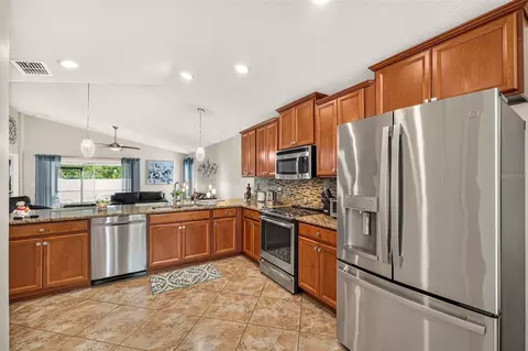 Kitchen - 10114 Ives Loop, Hudson, FL 34667 photo 1 of 7