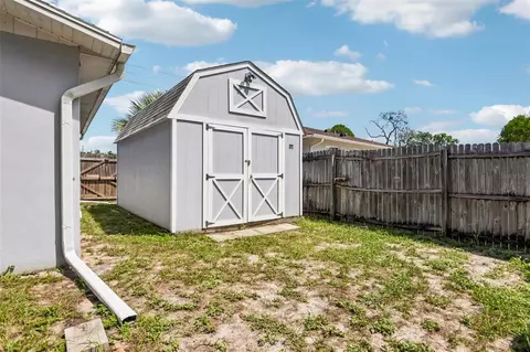 Exterior - 7446 Pinehurst Dr, Spring Hill, FL 34606 photo 7 of 7