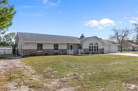 Exterior - 4286 Bluewater Ave, Spring Hill, FL 34606 photo 2 of 13