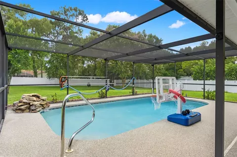 Exterior - 11201 Rainbow Woods Loop, Spring Hill, FL 34609 photo 1 of 18