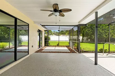 Exterior - 11201 Rainbow Woods Loop, Spring Hill, FL 34609 photo 2 of 18