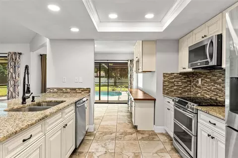 Kitchen - 11201 Rainbow Woods Loop, Spring Hill, FL 34609 photo 3 of 3