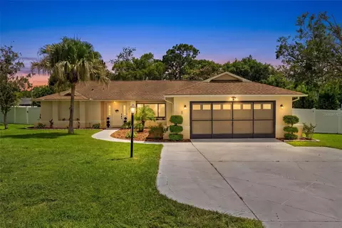 Exterior - 11201 Rainbow Woods Loop, Spring Hill, FL 34609 photo 7 of 18