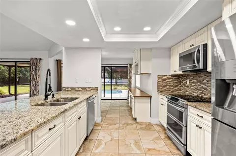 Kitchen - 11201 Rainbow Woods Loop, Spring Hill, FL 34609 photo 2 of 3