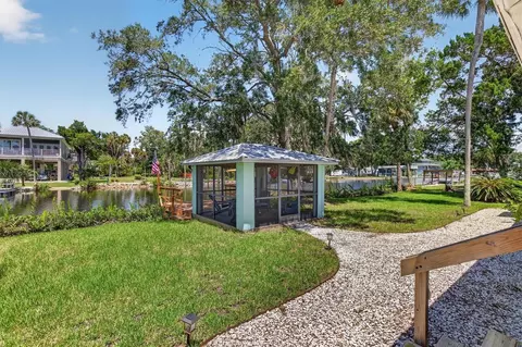 Exterior - 6086 Island Dr, Weeki Wachee, FL 34607 photo 2 of 21