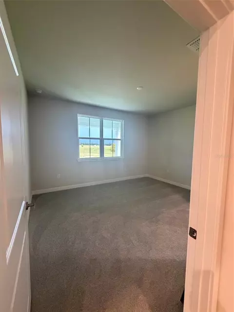 Bedroom - 18732 Highland Dew St, Spring Hill, FL 34610 photo 1 of 3