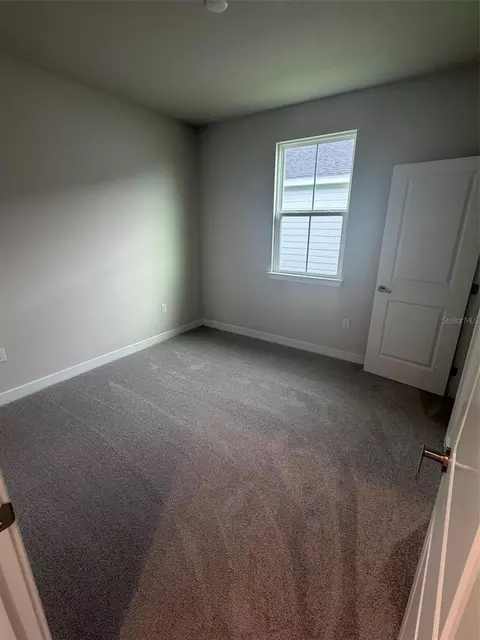 Bedroom - 18732 Highland Dew St, Spring Hill, FL 34610 photo 2 of 3