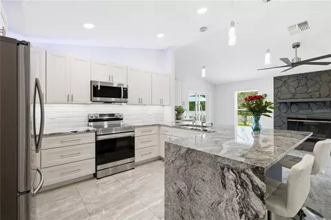 Kitchen - 8345 Apple Orchard Rd, Spring Hill, FL 34608 photo 1 of 6