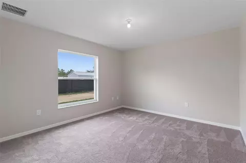 Bedroom - 12073 Manassas Ave, Weeki Wachee, FL 34614 photo 6 of 7