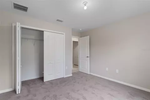 Bedroom - 12073 Manassas Ave, Weeki Wachee, FL 34614 photo 5 of 7