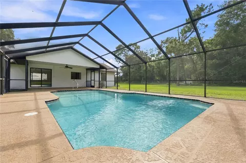Exterior - 15125 Willowood Ln, Spring Hill, FL 34604 photo 5 of 13