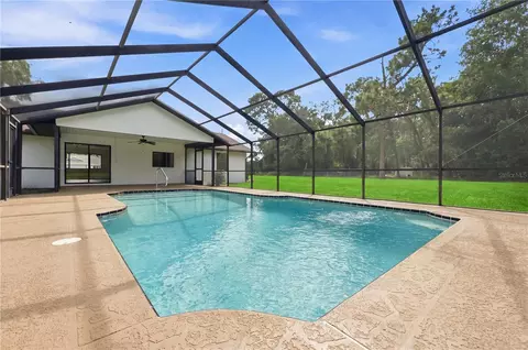 Exterior - 15125 Willowood Ln, Spring Hill, FL 34604 photo 10 of 13