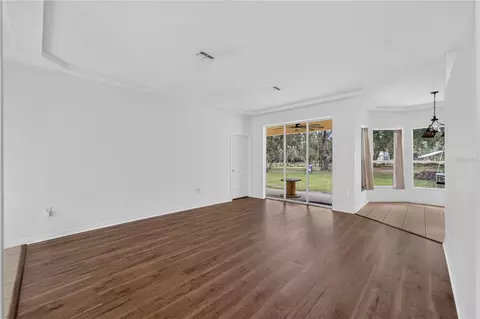 Living - 6476 Larry Ave, Webster, FL 33597 photo 6 of 11