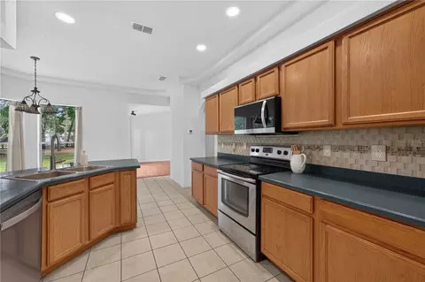 Kitchen - 6476 Larry Ave, Webster, FL 33597 photo 5 of 6