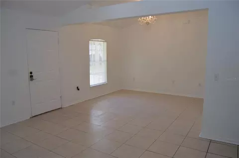 Living - 9010 Mccormick St, Spring Hill, FL 34608 photo 4 of 10