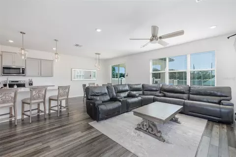 Living - 9224 Rally Spring Loop, Wesley Chapel, FL 33545 photo 3 of 3