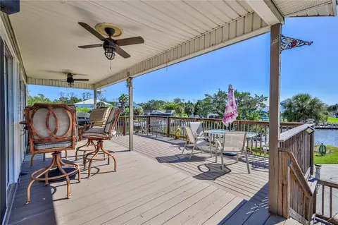 Exterior - 5046 Cedarbrook Ln, Hernando Beach, FL 34607 photo 6 of 21