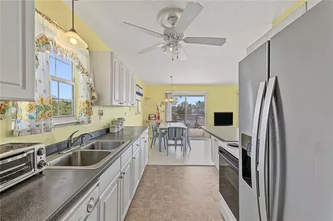 Kitchen - 5046 Cedarbrook Ln, Hernando Beach, FL 34607 photo 2 of 4