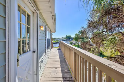 Exterior - 5046 Cedarbrook Ln, Hernando Beach, FL 34607 photo 5 of 21