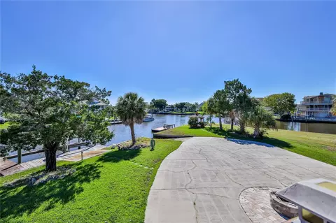 Exterior - 5046 Cedarbrook Ln, Hernando Beach, FL 34607 photo 10 of 21