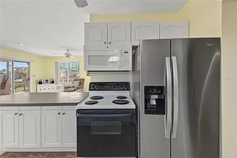 Kitchen - 5046 Cedarbrook Ln, Hernando Beach, FL 34607 photo 3 of 4