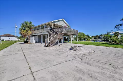 Exterior - 5046 Cedarbrook Ln, Hernando Beach, FL 34607 photo 12 of 21