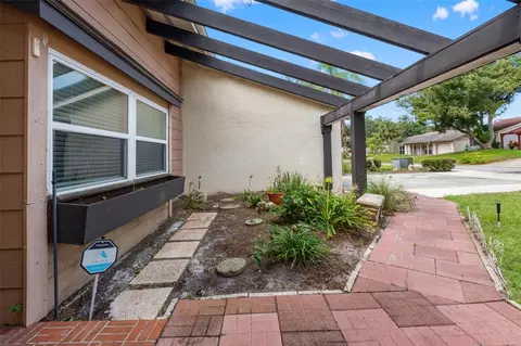 Exterior - 8024 Beaver Creek Loop, Hudson, FL 34667 photo 4 of 15