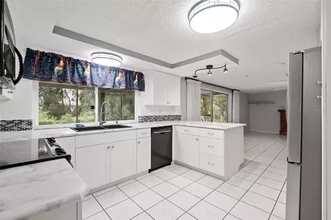 Kitchen - 8024 Beaver Creek Loop, Hudson, FL 34667 photo 1 of 7