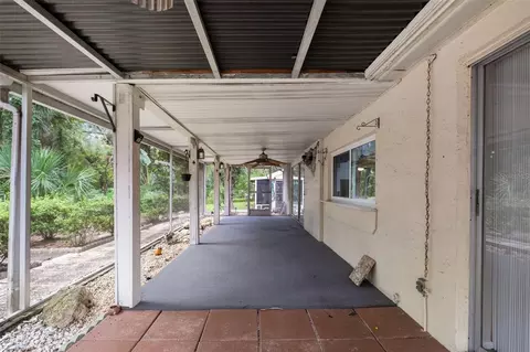 Exterior - 8024 Beaver Creek Loop, Hudson, FL 34667 photo 6 of 15