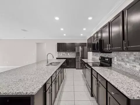 Kitchen - 6337 Nodoc Rd, Spring Hill, FL 34609 photo 1 of 7