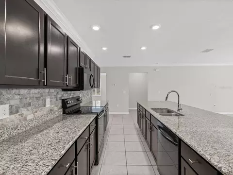 Kitchen - 6337 Nodoc Rd, Spring Hill, FL 34609 photo 6 of 7