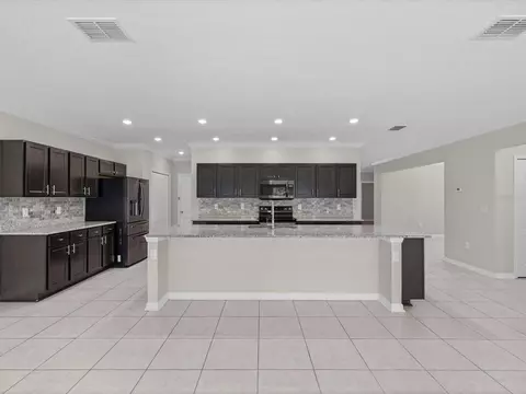 Kitchen - 6337 Nodoc Rd, Spring Hill, FL 34609 photo 3 of 7
