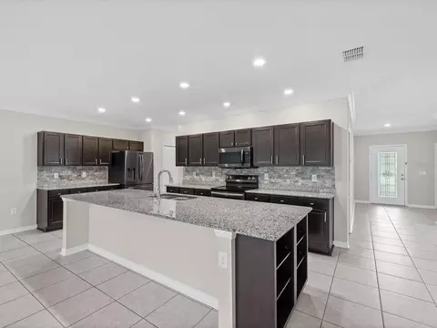 Kitchen - 6337 Nodoc Rd, Spring Hill, FL 34609 photo 5 of 7