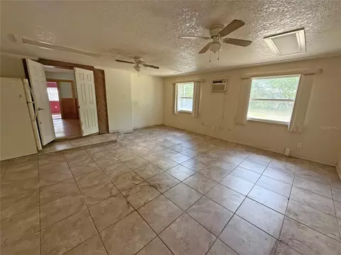 Living - 6134 Pinehurst Dr, Spring Hill, FL 34606 photo 5 of 8