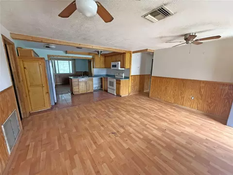 Living - 6134 Pinehurst Dr, Spring Hill, FL 34606 photo 2 of 8
